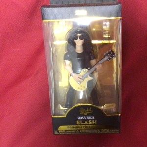 SLASH figurine and book